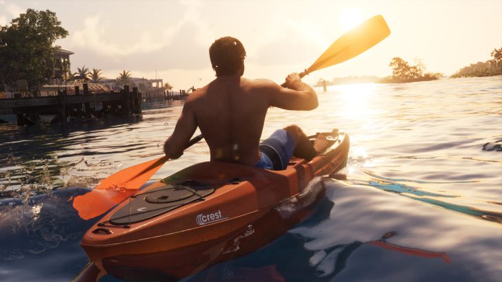A person in a 'Crest' kayak paddling on a sunlit lake near a wooden dock with palm trees in the distance.