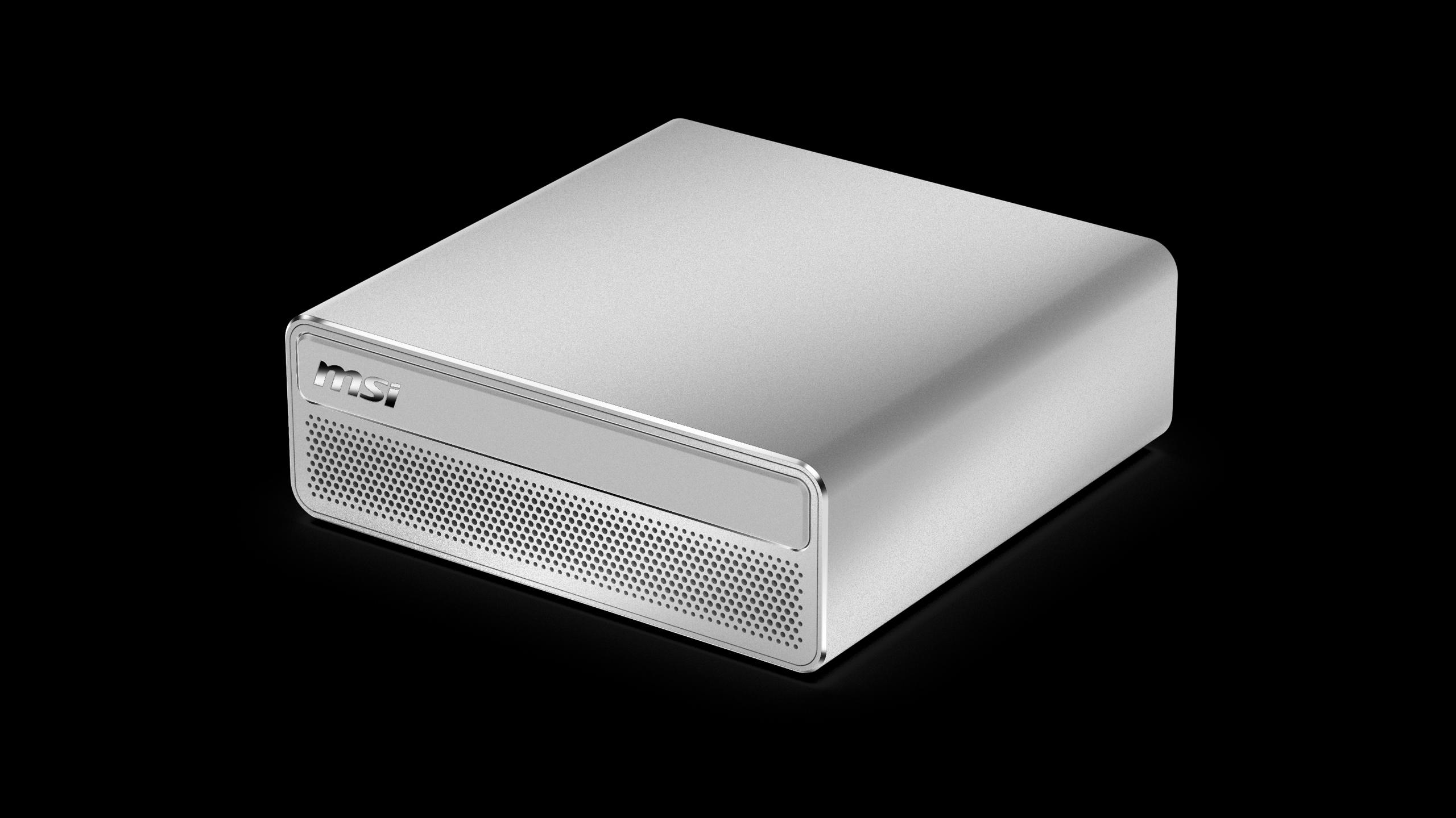 A silver MSI mini PC with a perforated front panel is shown against a black background.