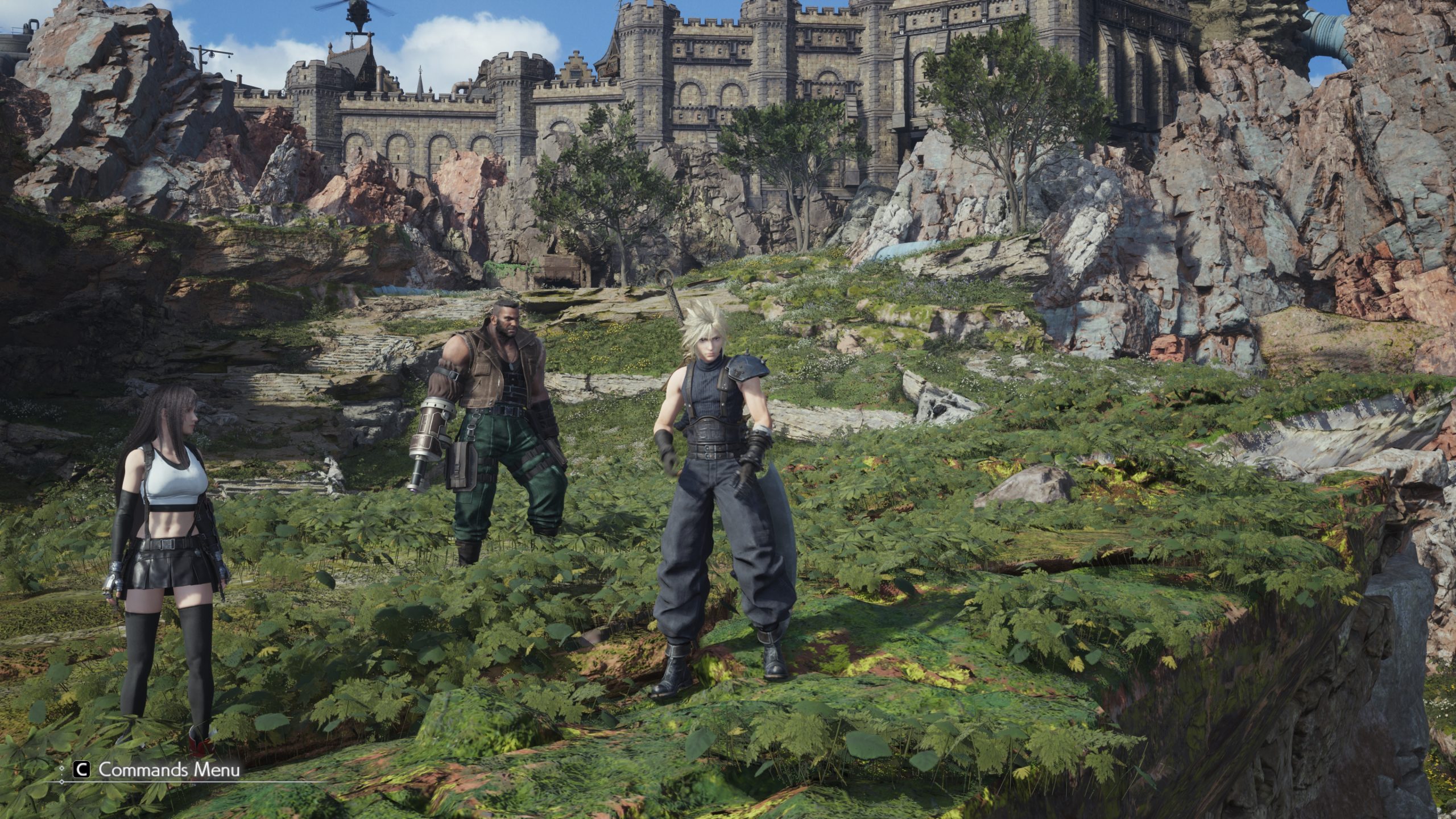 Characters from 'Final Fantasy VII Rebirth' stand on a grassy field with a medieval castle in the background, and 'Commands Menu' is visible on-screen.