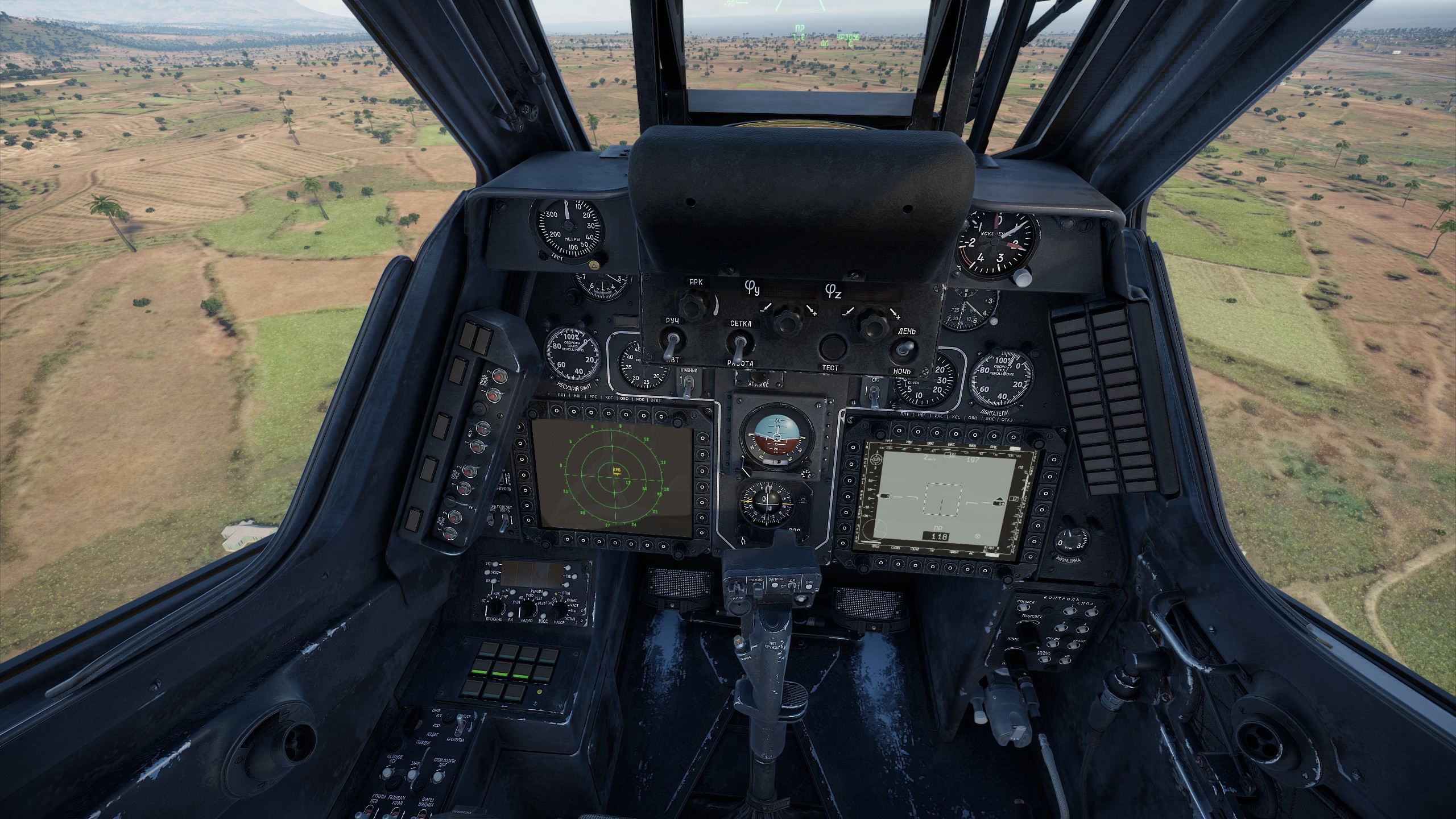 The cockpit view from a flight simulation game shows various gauges, dials, and radar screens, with a detailed landscape visible through the front window.