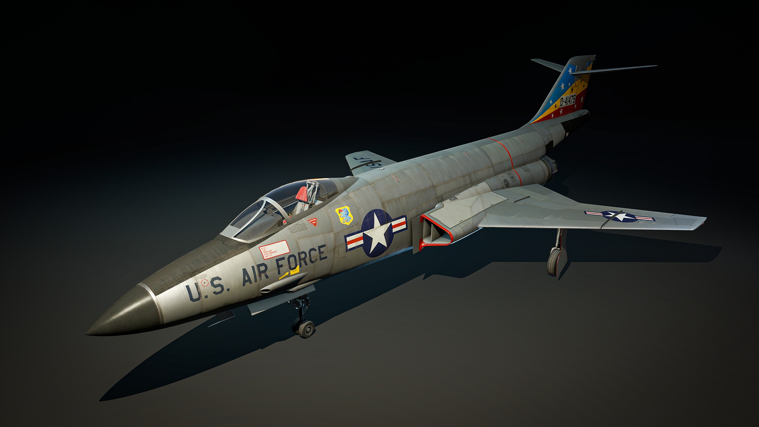 A detailed view of a U.S. Air Force jet with U.S. Air Force marked on the side, featuring distinctive star insignia and colorful tail design.