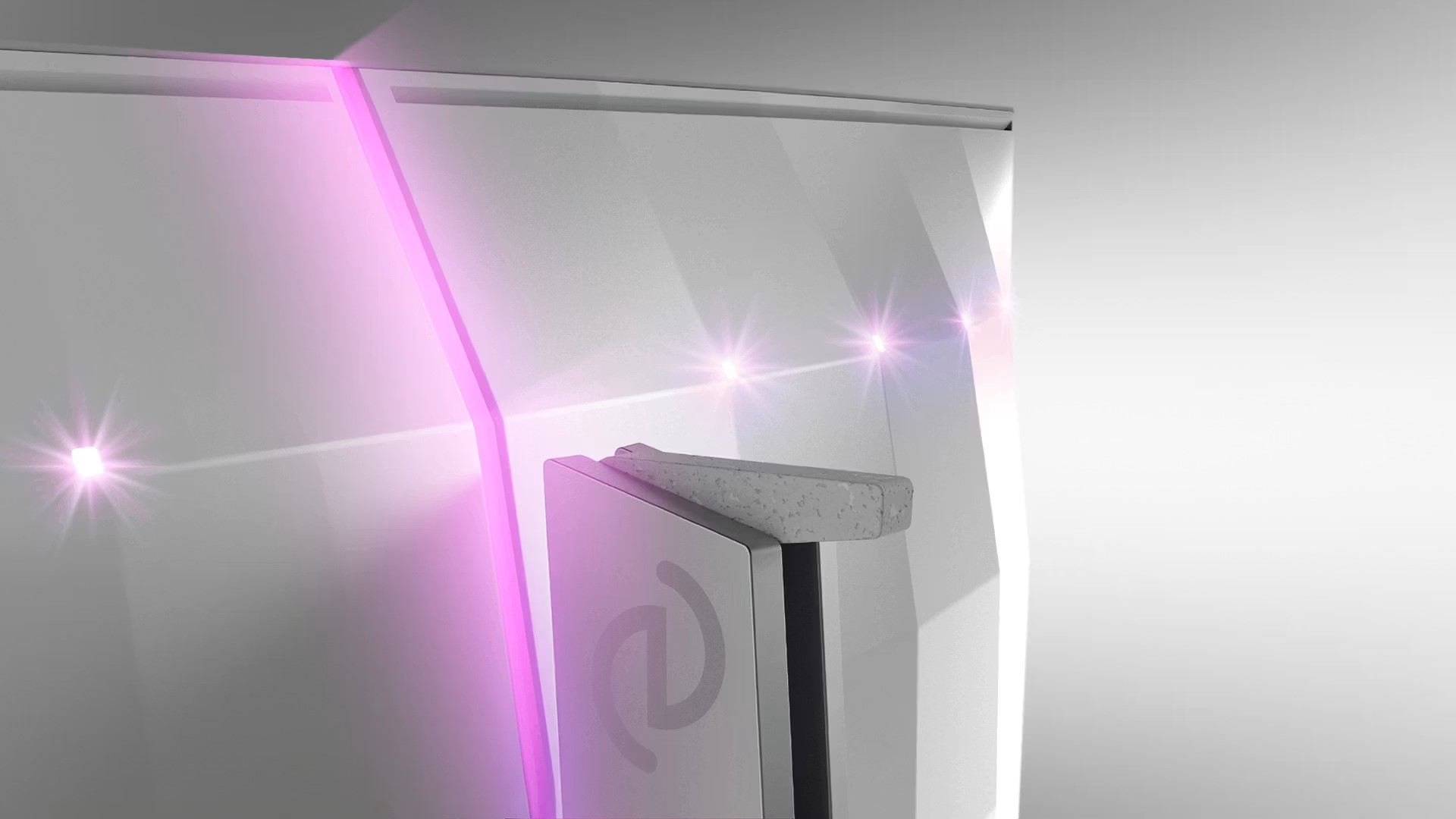 The image shows a detailed view of a silver casing design with pink LED light accents and a logo resembling a circular arrow.