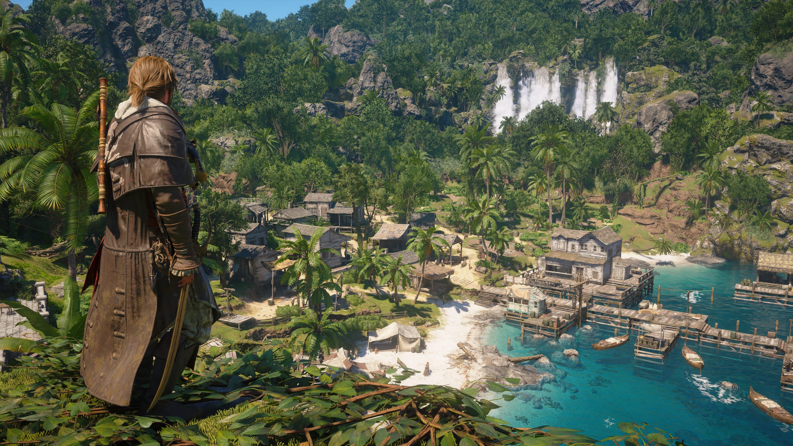 A character from Assassin's Creed IV: Black Flag surveys a detailed tropical village by the coast.