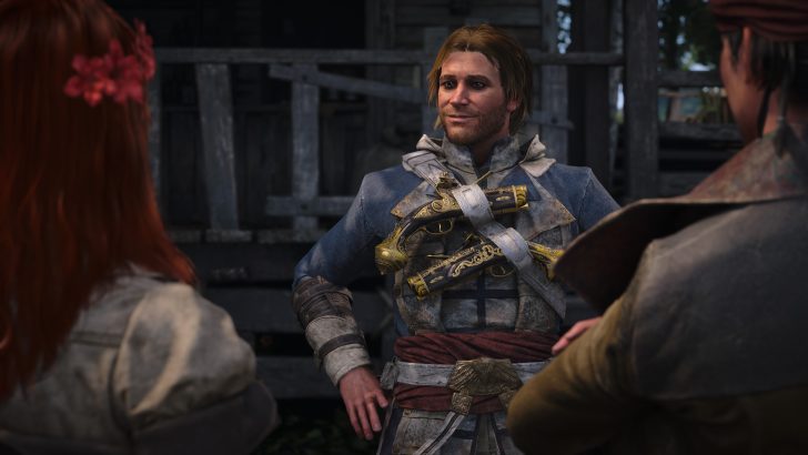 A character in Assassin's Creed Mirage wearing a detailed blue coat with gold-embellished pistols speaking to two others in a rustic setting.