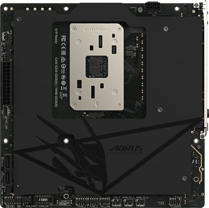A motherboard featuring the AORUS logo with a visible 'SOCKET AM5' mounting plate and various port labels, including 'CANICES-003(B)/NMB-003(B)' and 'ErP Ready'.