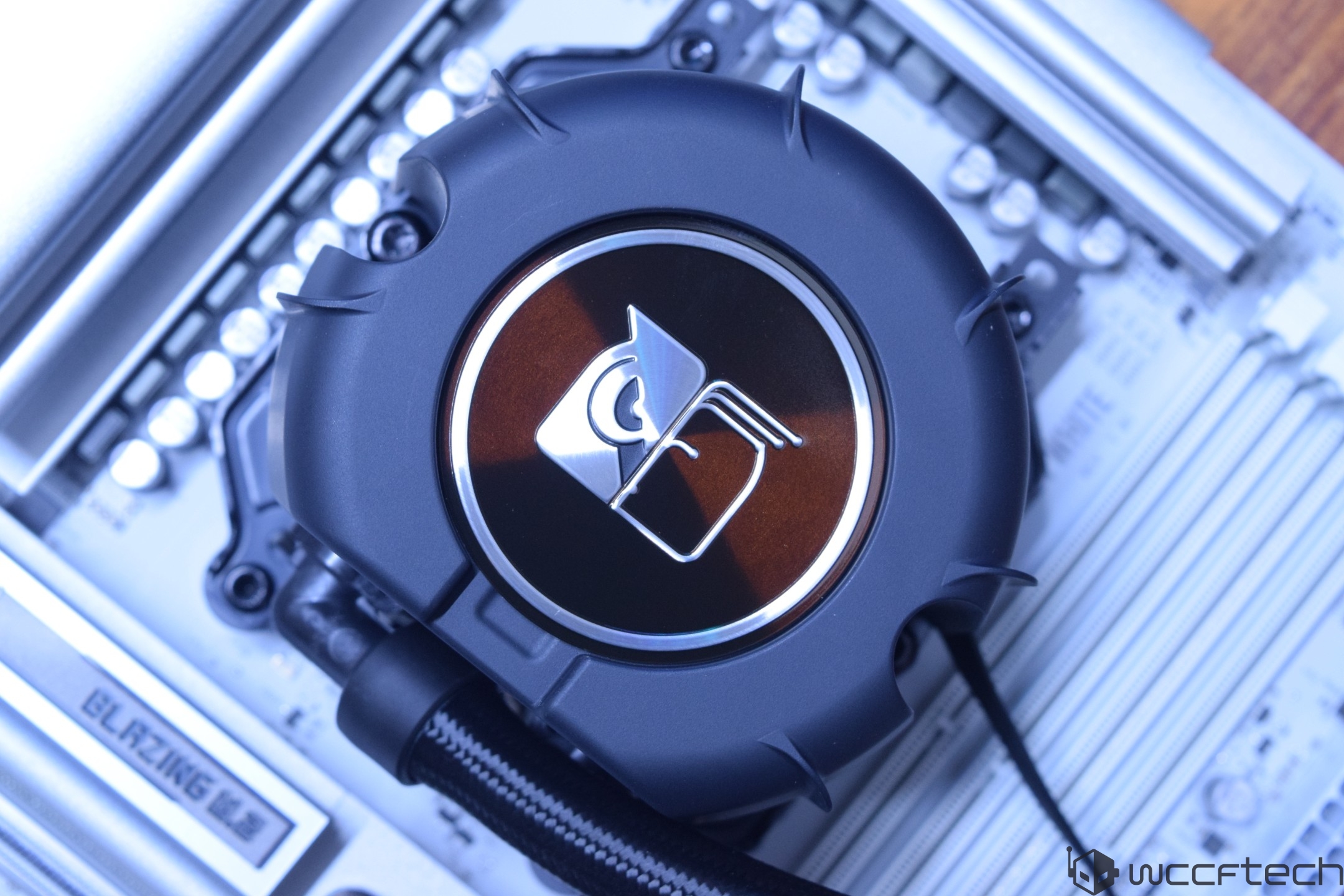 A close-up of a Gigabyte Aorus CPU cooler installed on a motherboard with 'Blazing' text visible.