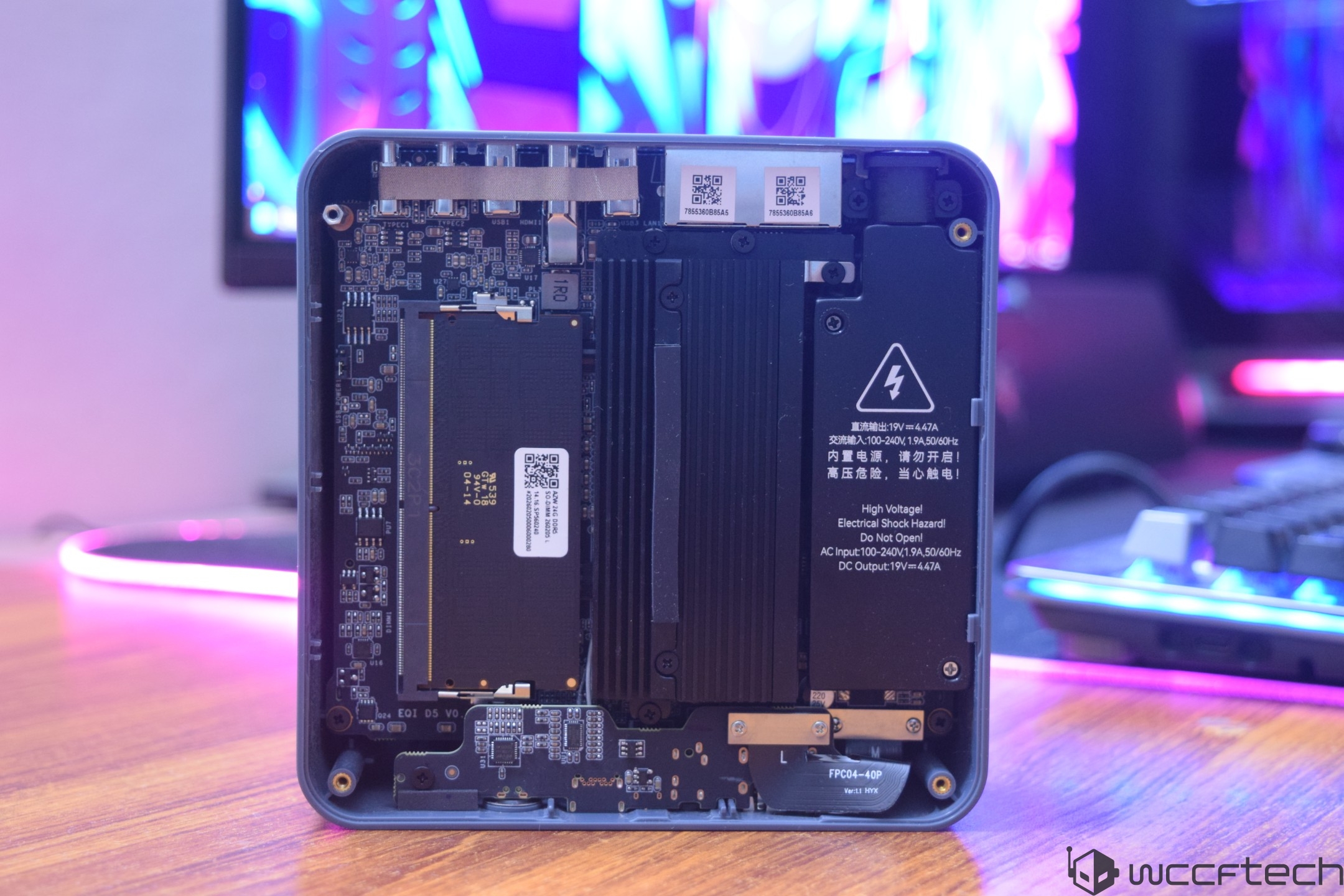 The interior view of a Beelink Mini PC shows detailed circuitry, memory modules, and a visible warning label 'High Voltage' on the power supply.