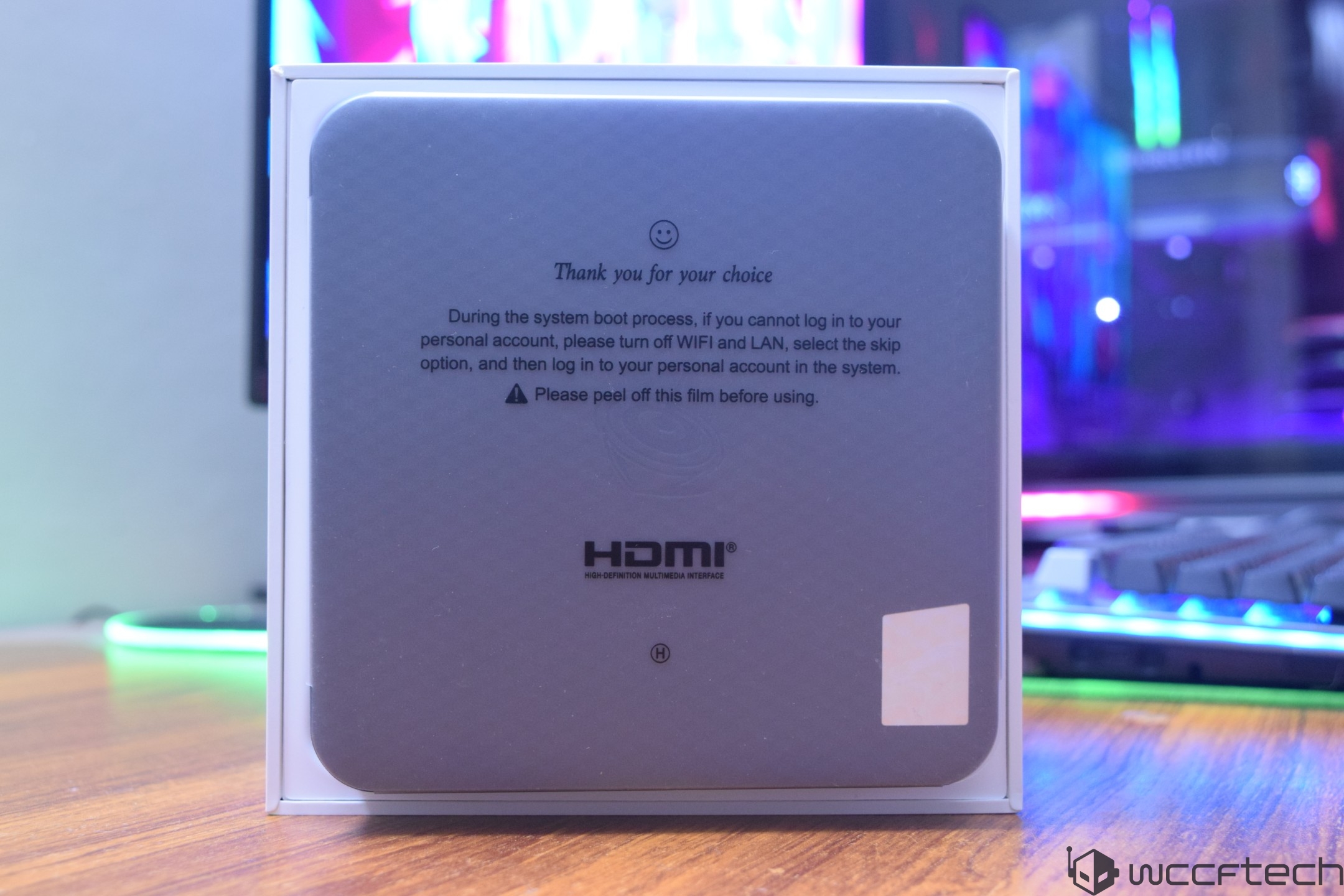 A device box on a table displays setup instructions and an HDMI logo, with a message reading, Thank you for your choice.