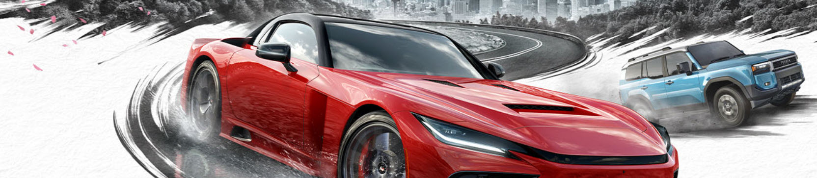 A red sports car and a blue SUV drift on a winding road, surrounded by a snowy landscape.