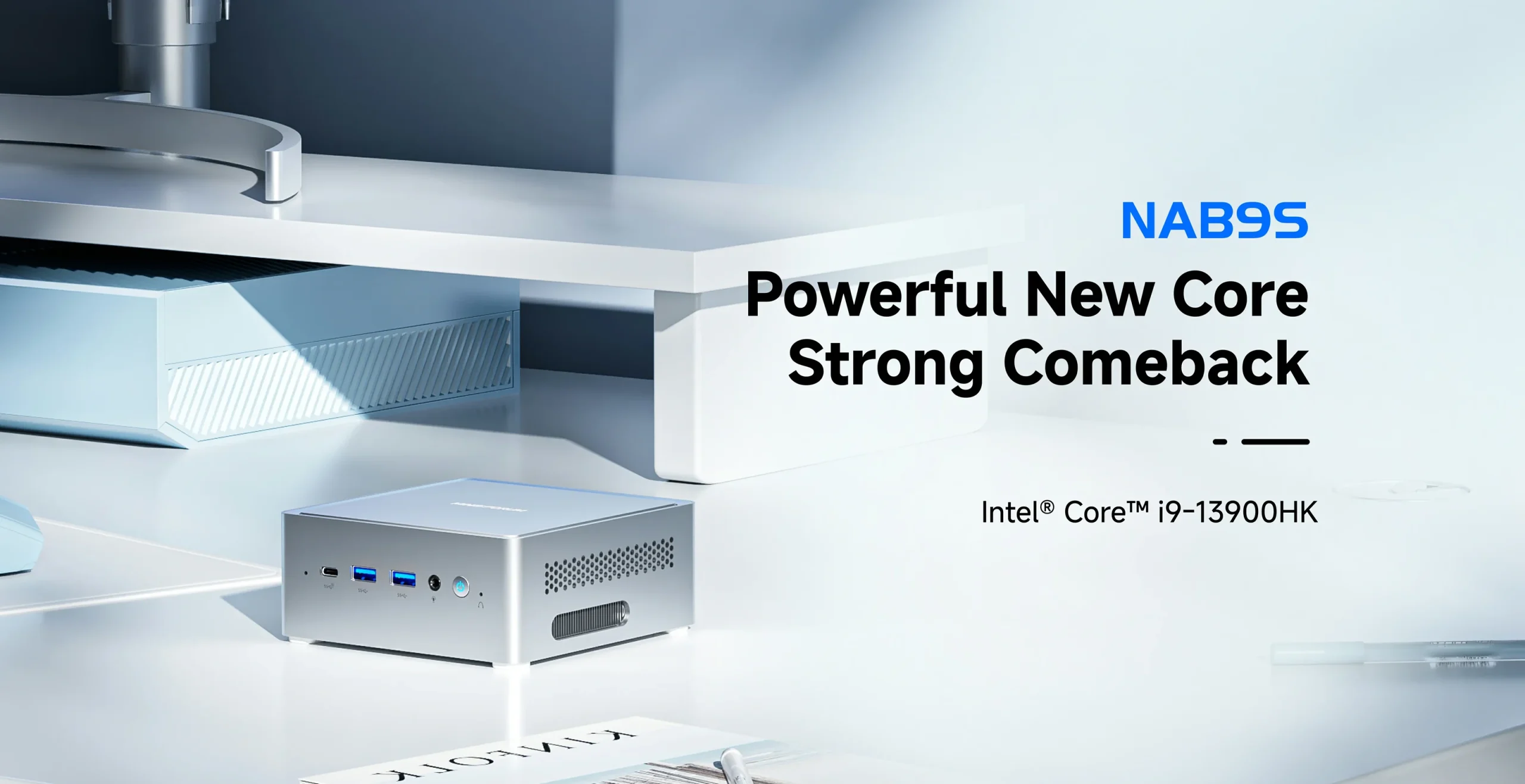 A compact silver device with USB ports labeled as NAB9S is shown next to text stating 'Powerful New Core Strong Comeback' and 'Intel® Core™ i9-13900HK.'