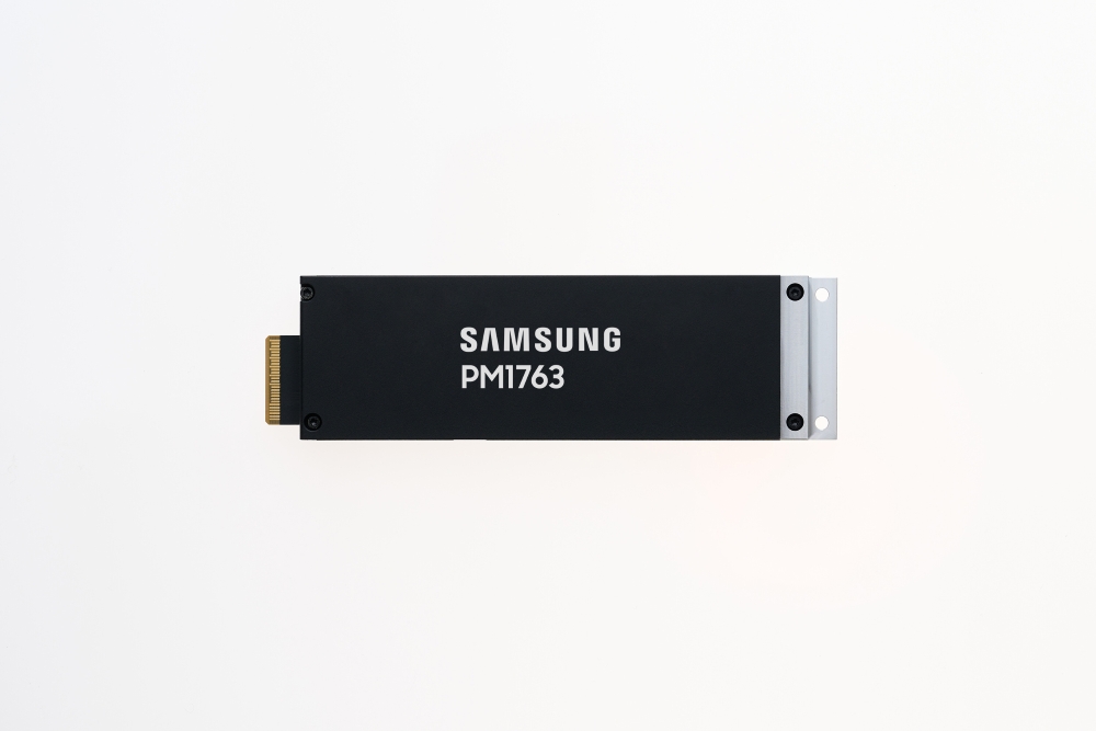 A Samsung PM1763 solid-state drive (SSD) with a black casing is shown against a white background.