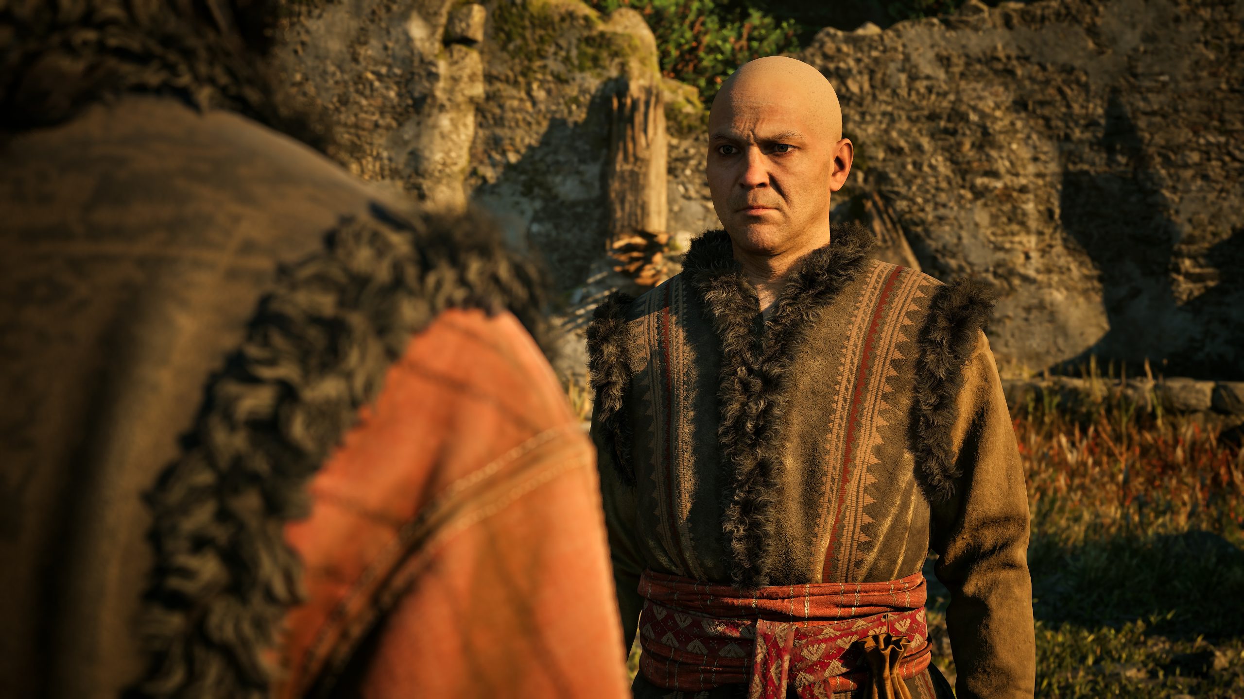 A character in traditional attire appears in a dialogue scene from the game 'Baldur's Gate 3'.