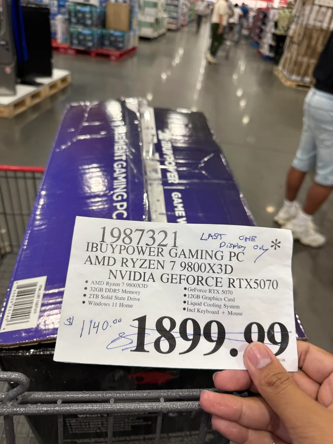 A price tag for an iBUYPOWER Gaming PC with AMD Ryzen 7 9800X3D and NVIDIA GeForce RTX 5070 shows a price of $1899.99, marked 'LAST ONE display only'.