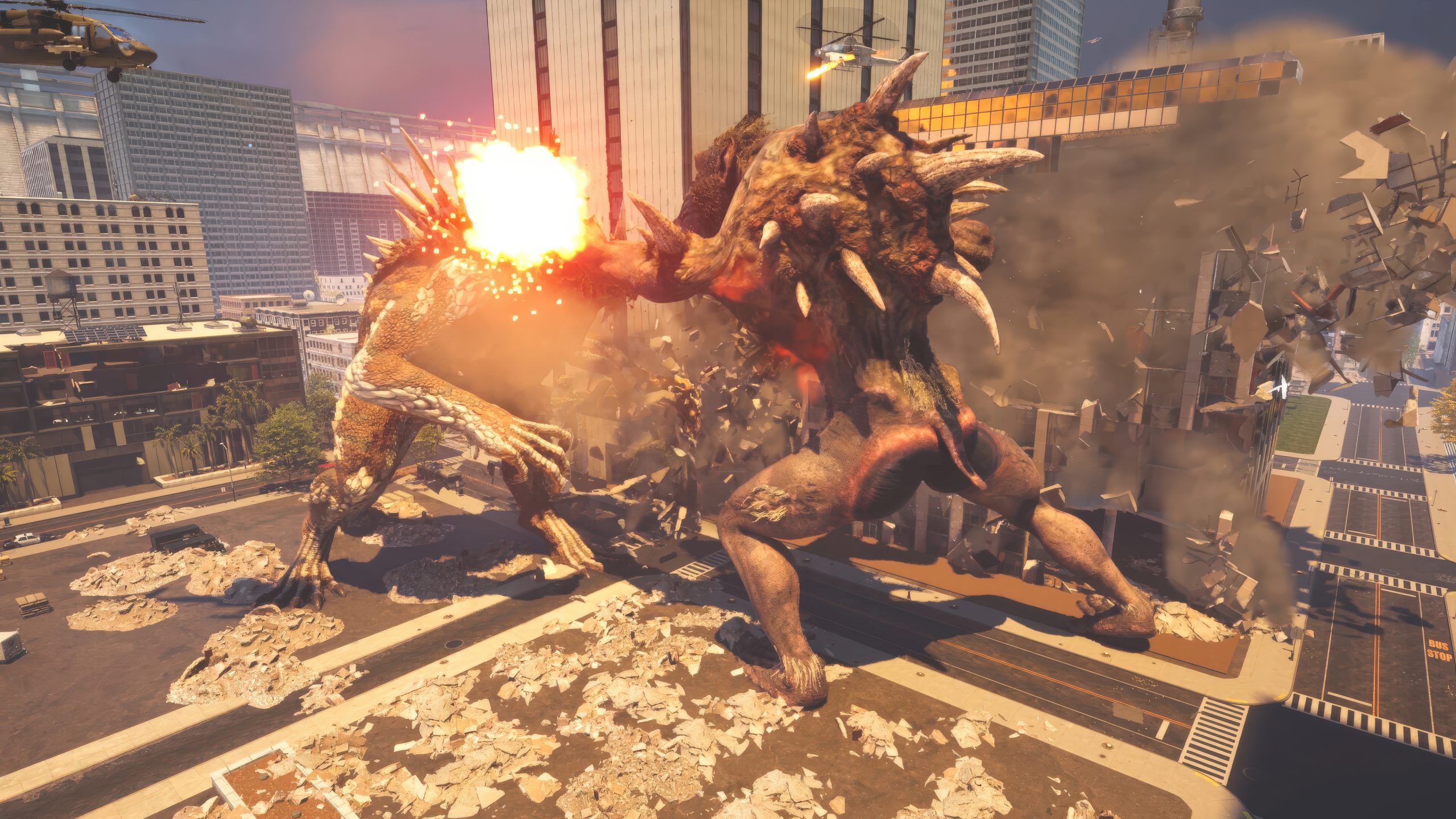 Two giant creatures clashing amidst a cityscape, causing buildings to collapse and debris to fly, with explosions visible and a helicopter hovering nearby.