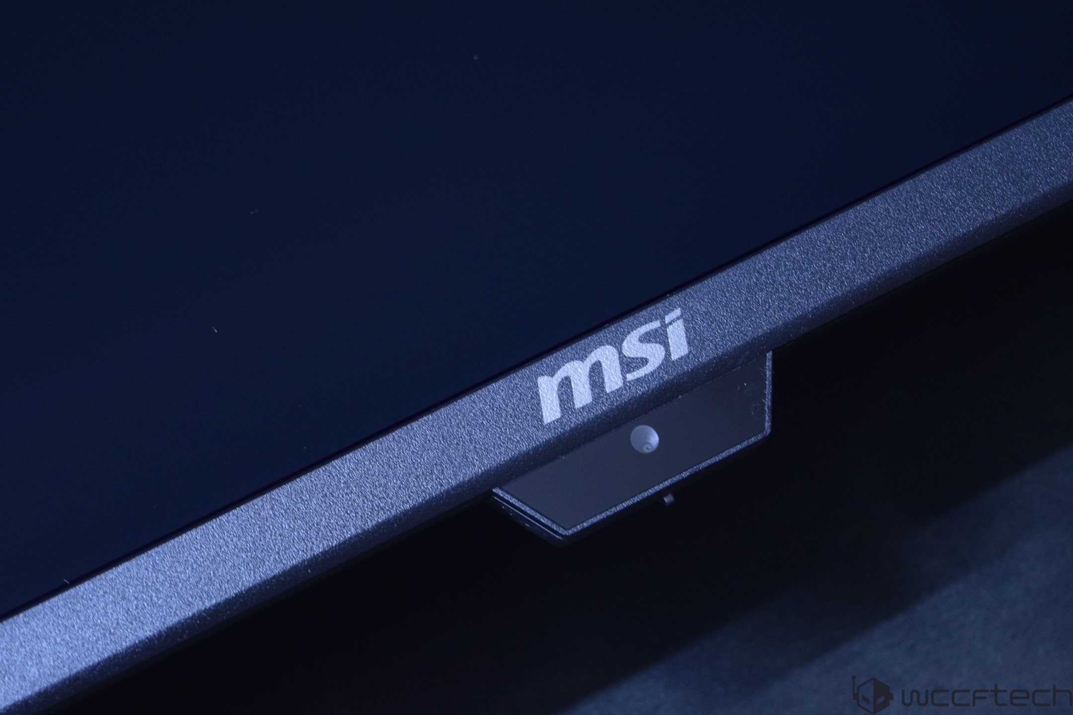The lower edge of an MSI monitor with a visible logo.