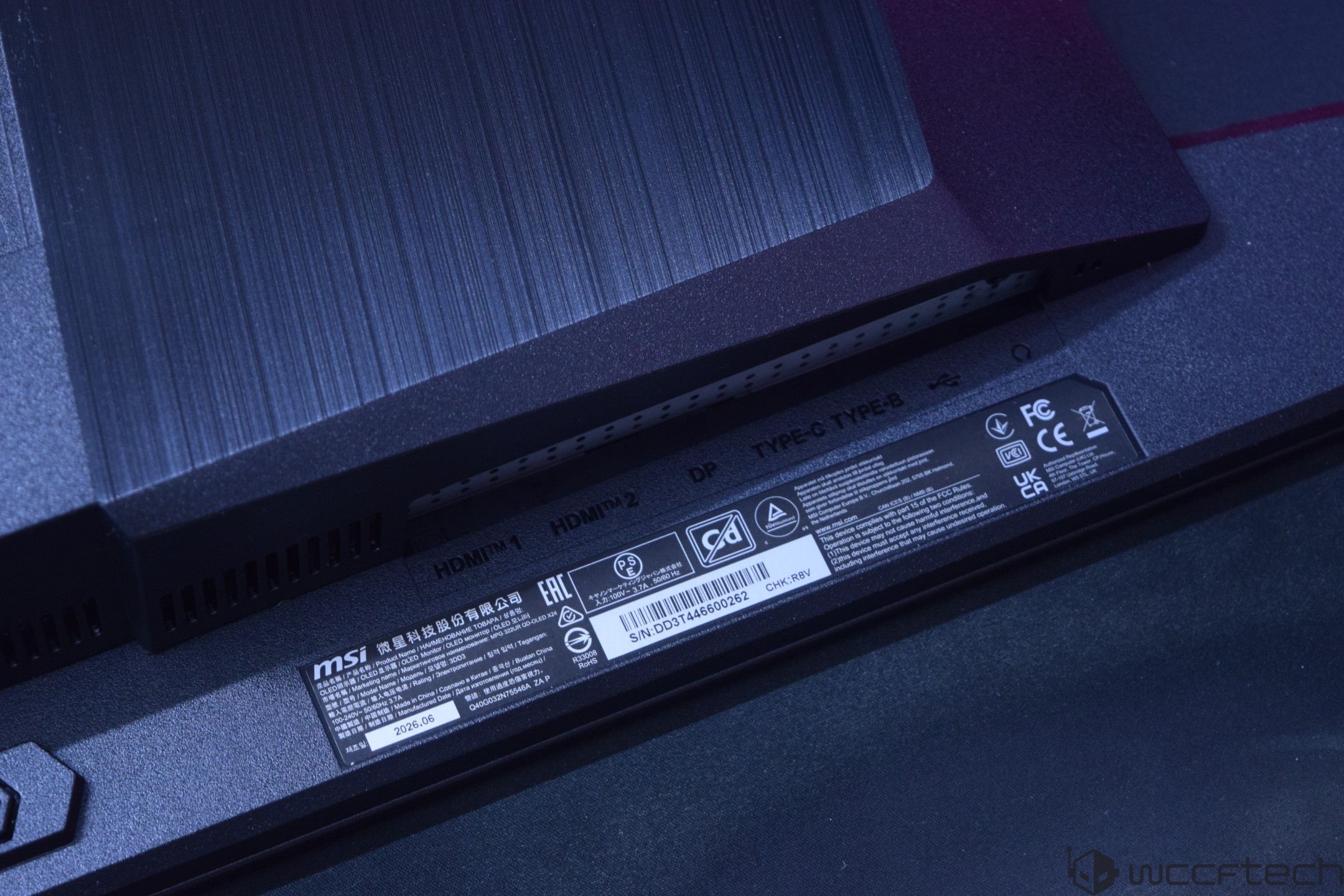 The image shows the back of an MSI monitor with visible port labels including 'HDMI 1', 'HDMI 2', 'DP', and 'Type-C'.