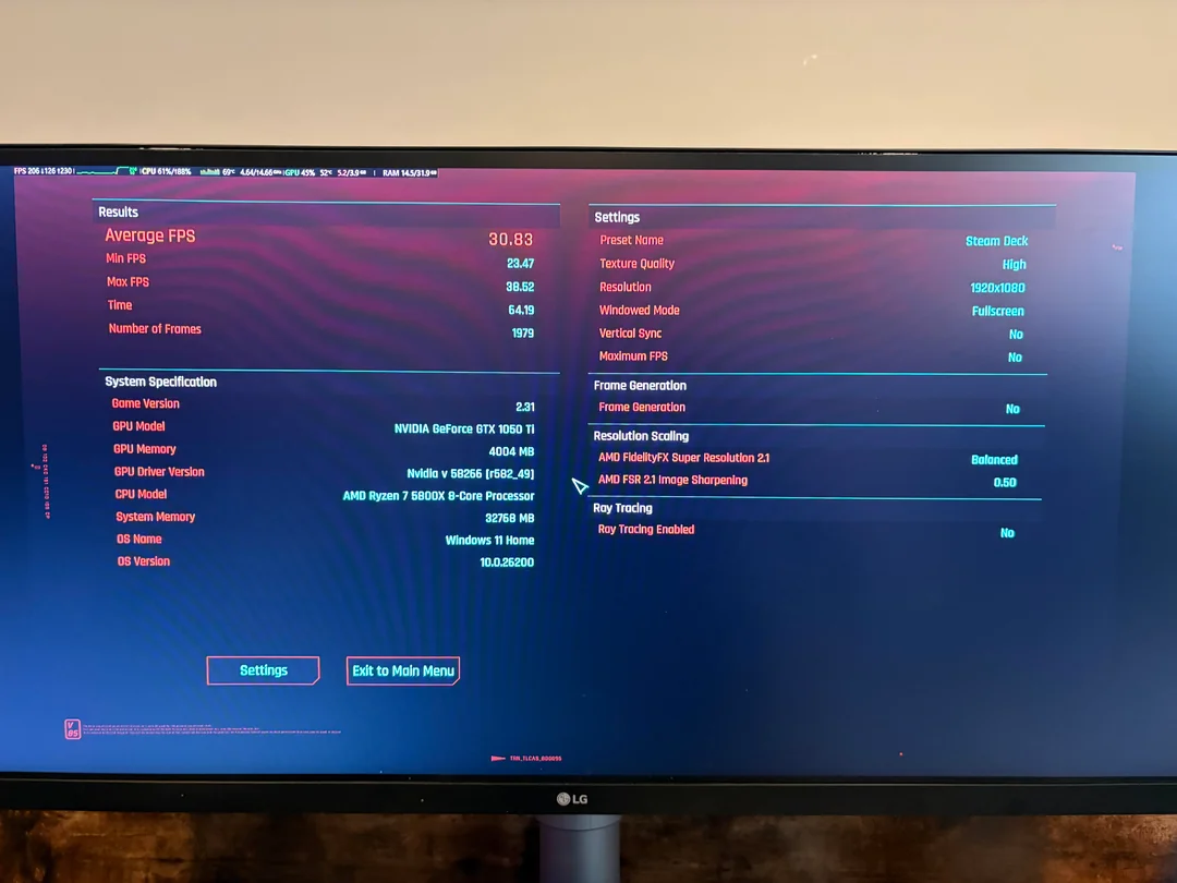 A monitor displays a gaming benchmark showing 'Average FPS 30.83' with an NVIDIA GeForce GTX 1050 Ti and AMD Ryzen 7 5800X 8-core processor, running on Windows 11 Home, with settings set to 'Steam Deck'.